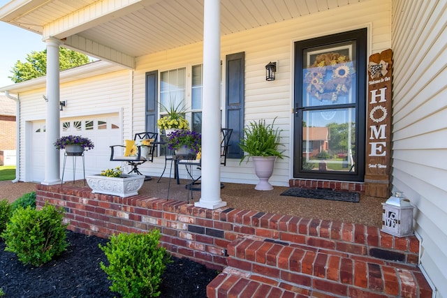 1101 Wedgewood Dr, Gallatin, TN 37066 - doorway to property featuring a porch and a garage