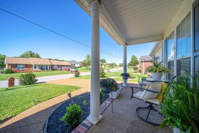 1101 Wedgewood Dr, Gallatin, TN 37066 - porch featuring a yard and a residential view