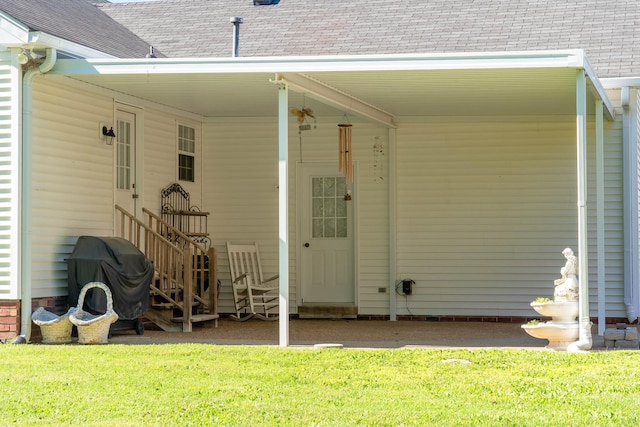 1101 Wedgewood Dr, Gallatin, TN 37066 - doorway to property featuring a shingled roof and a yard