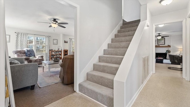 104 Oak Park Dr, Tullahoma, TN 37388 - stairs with a ceiling fan and carpet floors