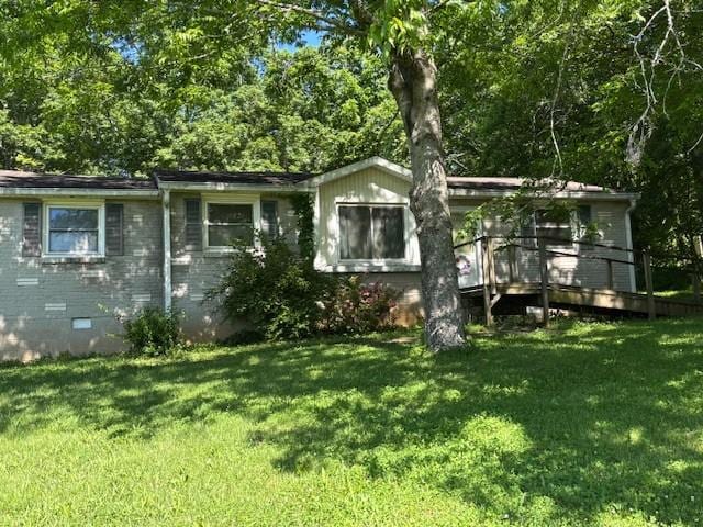 251 Spring Valley Dr E, Mount Juliet, TN 37122 - view of front facade featuring crawl space, a front lawn, and a wooden deck