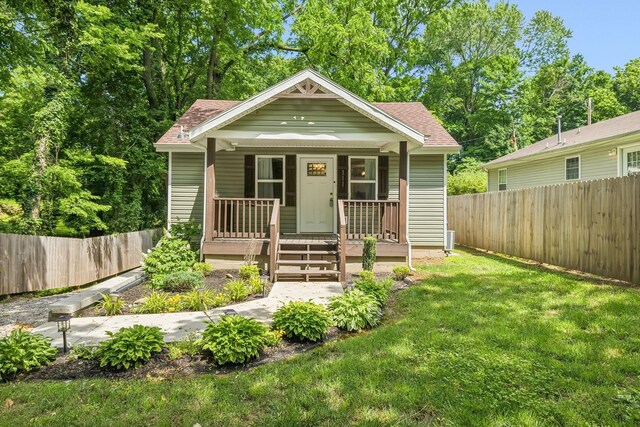 311 Locust St, Clarksville, TN 37042 - view of front of home featuring covered porch and roof with shingles