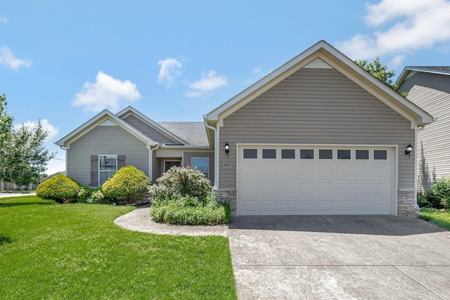 6001 Ten Bears Way, Spring Hill, TN 37174 - view of front of property featuring stone siding, a front yard, driveway, and a garage