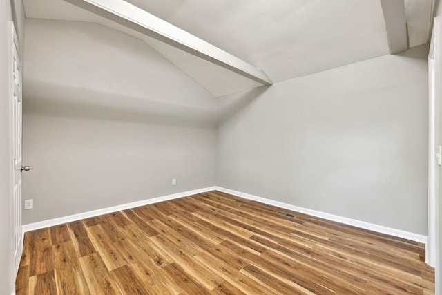 120 Johns St, La Vergne, TN 37086 - bonus room featuring vaulted ceiling, baseboards, and wood finished floors