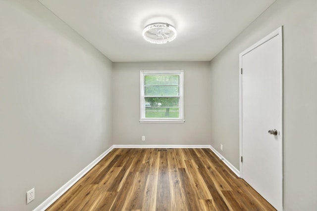 120 Johns St, La Vergne, TN 37086 - spare room featuring wood finished floors and baseboards