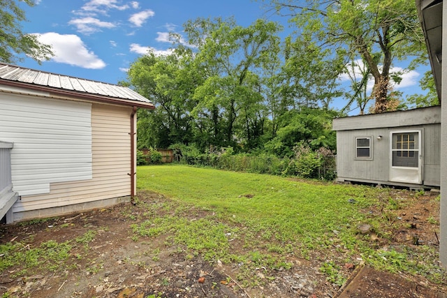 120 Johns St, La Vergne, TN 37086 - view of green lawn featuring an outdoor structure