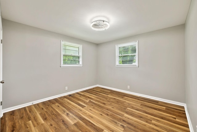 120 Johns St, La Vergne, TN 37086 - spare room with baseboards and wood finished floors