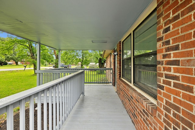 120 Johns St, La Vergne, TN 37086 - wooden porch featuring a yard