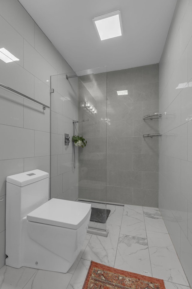 1011 Murfreesboro Rd Unit L3, Franklin, TN 37064 - full bathroom with marble finish flooring, toilet, walk in shower, and tile walls