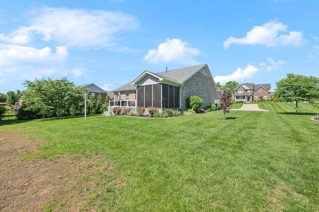 505 Cherry Blossom Way, Lebanon, TN 37087 - rear view of property with a sunroom and a yard