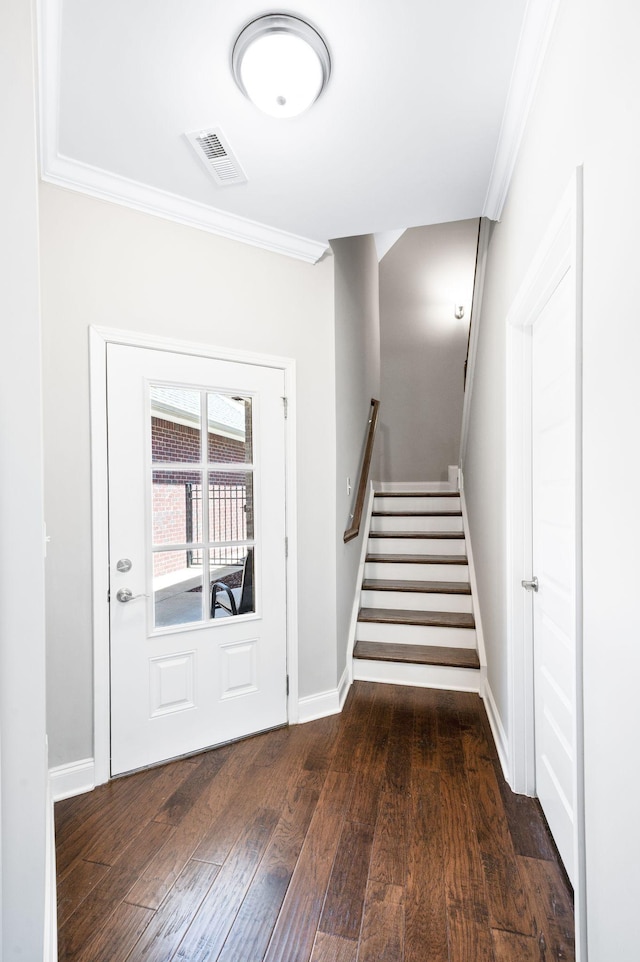 3023 Moultrie Cir, Franklin, TN 37064 - foyer entrance featuring ornamental molding, dark wood finished floors, stairway, and baseboards