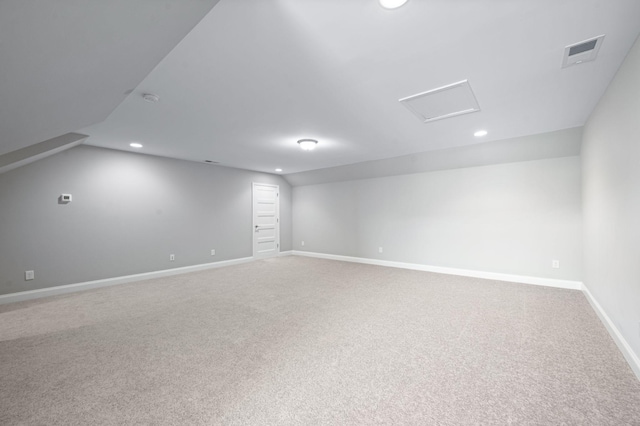 3023 Moultrie Cir, Franklin, TN 37064 - carpeted empty room with lofted ceiling, recessed lighting, baseboards, and attic access