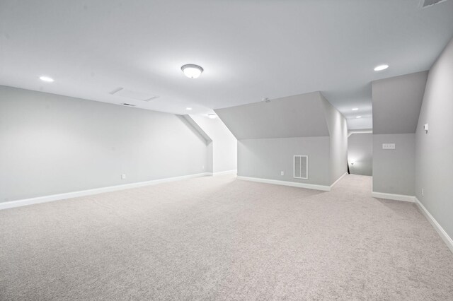 3023 Moultrie Cir, Franklin, TN 37064 - additional living space with light carpet, baseboards, recessed lighting, and lofted ceiling