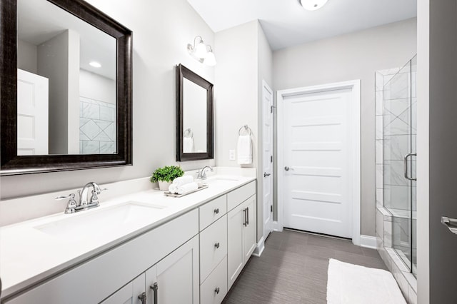 3023 Moultrie Cir, Franklin, TN 37064 - bathroom with double vanity, a shower stall, and baseboards
