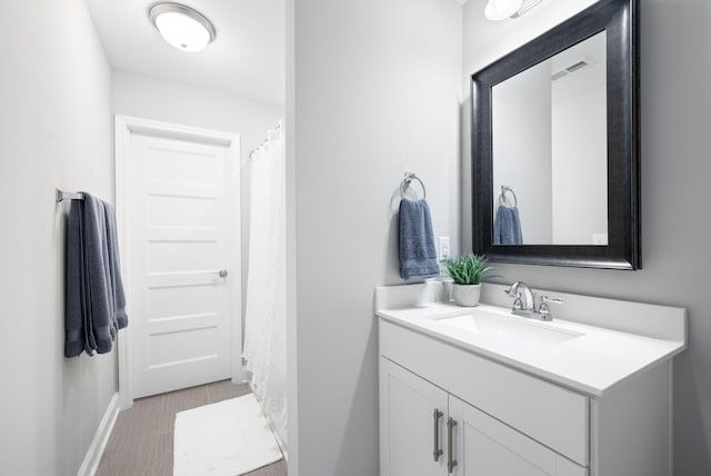 3023 Moultrie Cir, Franklin, TN 37064 - full bathroom with vanity and baseboards