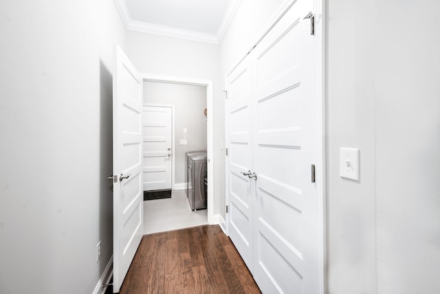 3023 Moultrie Cir, Franklin, TN 37064 - corridor with crown molding, washer and clothes dryer, dark wood-type flooring, and baseboards