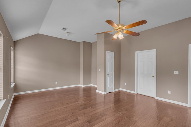 2240 Joann Dr, Spring Hill, TN 37174 - empty room featuring vaulted ceiling, a ceiling fan, wood finished floors, and baseboards