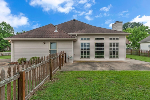 2240 Joann Dr, Spring Hill, TN 37174 - back of property featuring a patio area, a chimney, and roof with shingles
