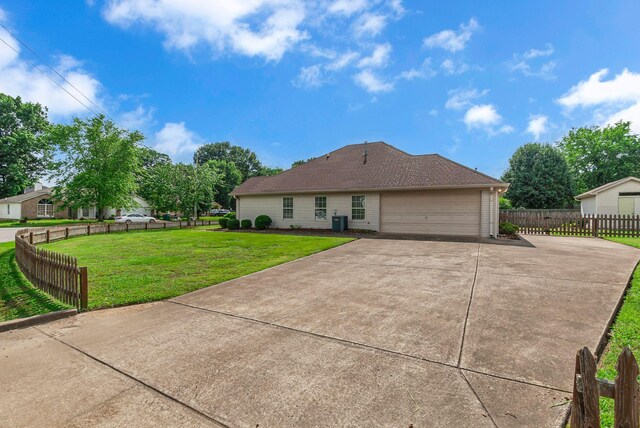 2240 Joann Dr, Spring Hill, TN 37174 - back of house with a garage and concrete driveway