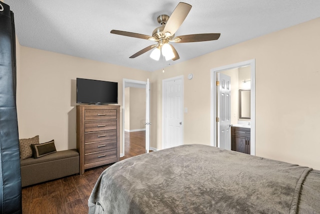 3387 Oak Park Dr, Clarksville, TN 37042 - bedroom featuring dark wood-style flooring, ceiling fan, and connected bathroom