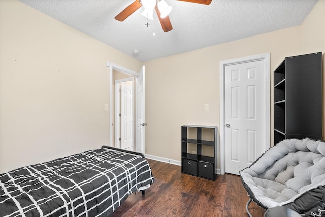 3387 Oak Park Dr, Clarksville, TN 37042 - bedroom with wood finished floors, a textured ceiling, ceiling fan, and baseboards