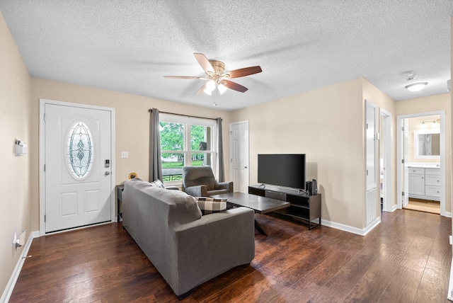 3387 Oak Park Dr, Clarksville, TN 37042 - living area featuring wood finished floors, a ceiling fan, baseboards, and a textured ceiling