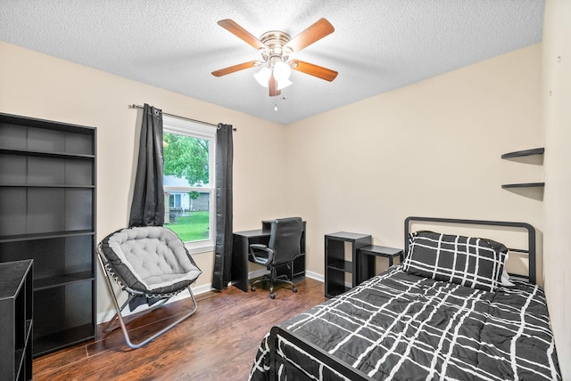3387 Oak Park Dr, Clarksville, TN 37042 - bedroom with wood finished floors, a textured ceiling, ceiling fan, and baseboards