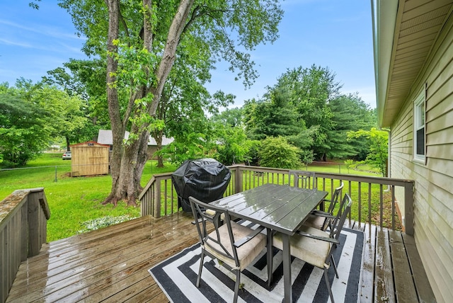 3387 Oak Park Dr, Clarksville, TN 37042 - deck featuring outdoor dining space, area for grilling, and view of scattered trees