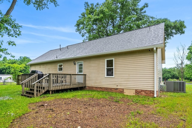 3387 Oak Park Dr, Clarksville, TN 37042 - rear view of house featuring central AC, a deck, roof with shingles, and a yard