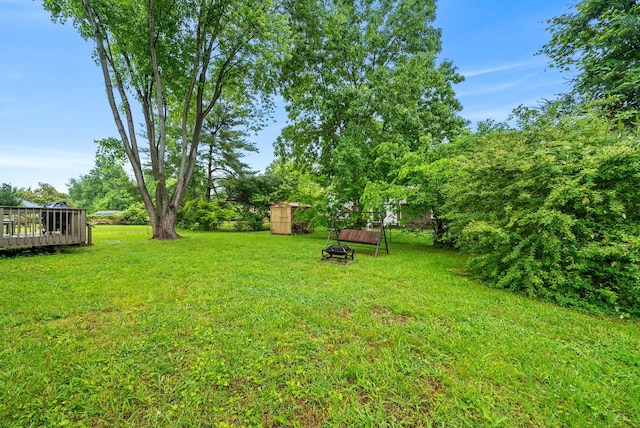 3387 Oak Park Dr, Clarksville, TN 37042 - view of green lawn with a wooden deck