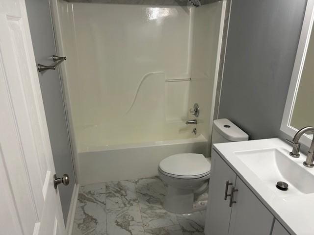 1047 Tylertown Rd, Clarksville, TN 37040 - bathroom with marble look tile flooring, vanity, toilet, and washtub / shower combination