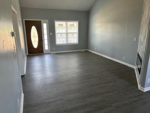 1047 Tylertown Rd, Clarksville, TN 37040 - foyer entrance featuring baseboards and dark wood-type flooring