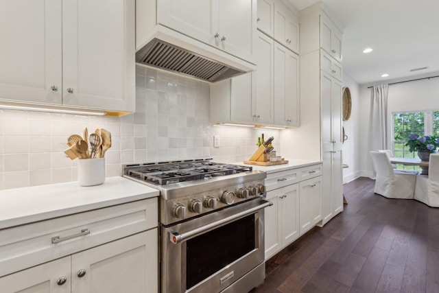 4034 Merryman Ln, Murfreesboro, TN 37127 - kitchen featuring high end stove, ventilation hood, recessed lighting, light countertops, and dark wood-style flooring