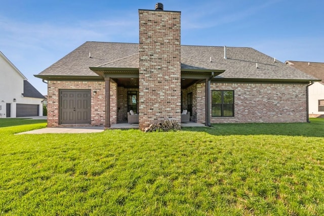 4034 Merryman Ln, Murfreesboro, TN 37127 - back of house with a chimney, a lawn, and roof with shingles