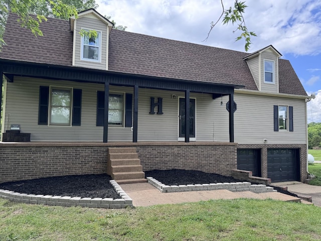 1111 Craig Moore Rd, Lewisburg, TN 37091 - view of front of property featuring covered porch, brick siding, an attached garage, and a shingled roof