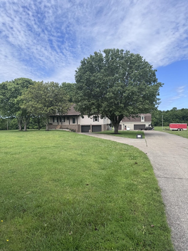 1111 Craig Moore Rd, Lewisburg, TN 37091 - ranch-style house with driveway and a front lawn