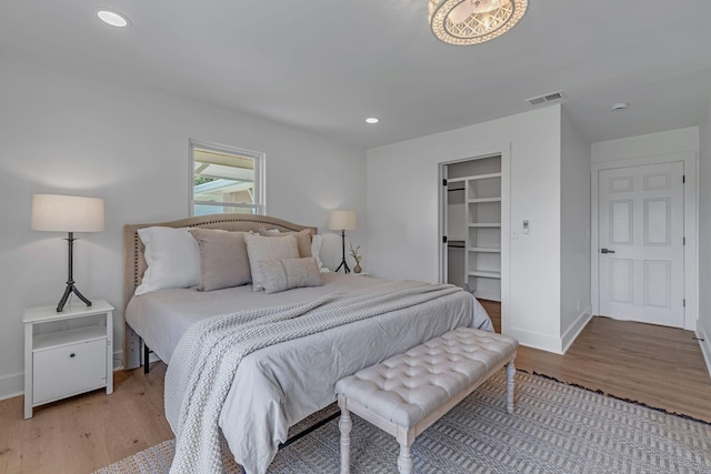 41 Trice Rd, Lebanon, TN 37087 - bedroom featuring light wood finished floors, baseboards, recessed lighting, and a walk in closet