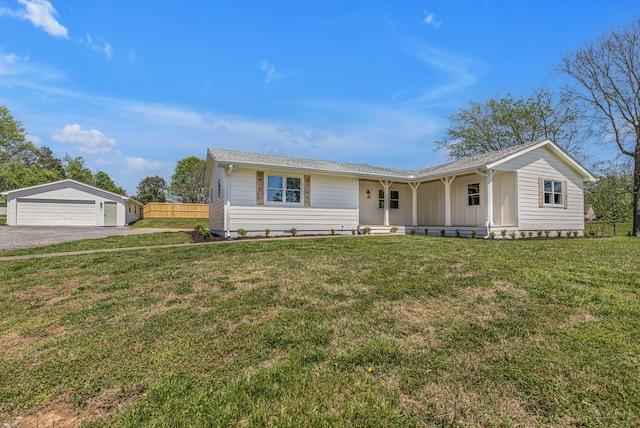 41 Trice Rd, Lebanon, TN 37087 - ranch-style home featuring a detached garage, a porch, and an outdoor structure