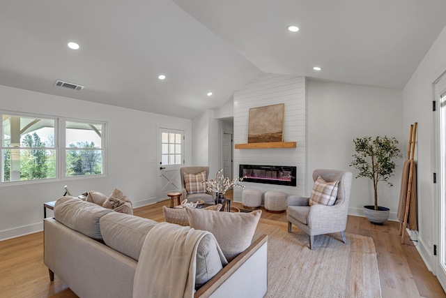 41 Trice Rd, Lebanon, TN 37087 - living area featuring baseboards, a fireplace, vaulted ceiling, light wood-style floors, and recessed lighting
