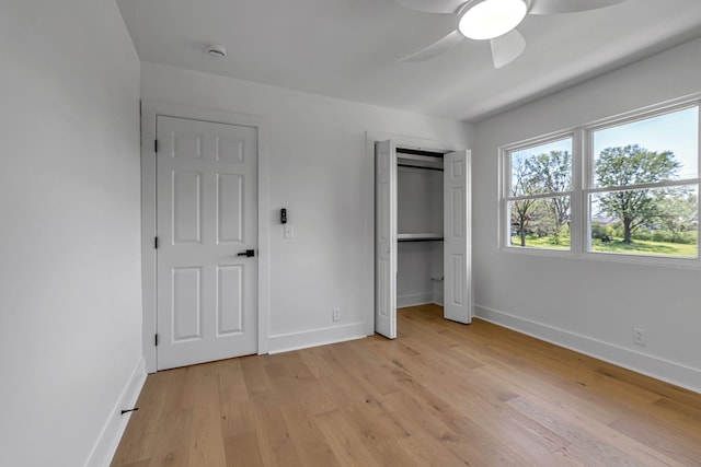 41 Trice Rd, Lebanon, TN 37087 - unfurnished bedroom with light wood finished floors, baseboards, a ceiling fan, and a closet