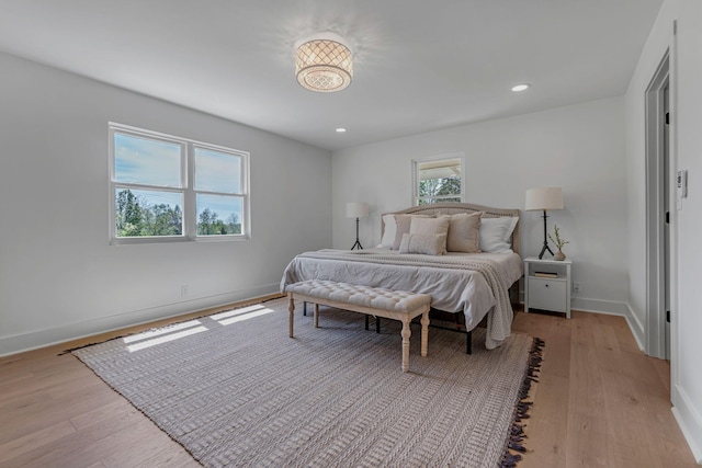 41 Trice Rd, Lebanon, TN 37087 - bedroom with light wood-style floors, baseboards, and recessed lighting
