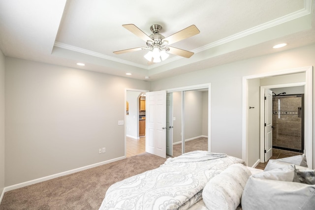 103 Alice Smith Dr, Portland, TN 37148 - bedroom featuring ornamental molding, light colored carpet, a tray ceiling, recessed lighting, and a closet