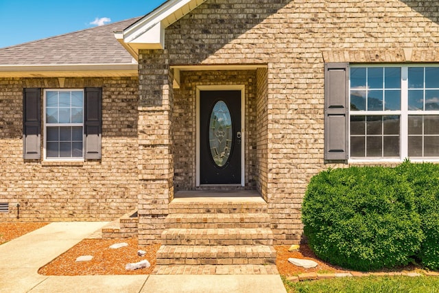 103 Alice Smith Dr, Portland, TN 37148 - doorway to property featuring brick siding and a shingled roof