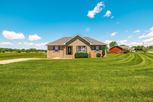 103 Alice Smith Dr, Portland, TN 37148 - ranch-style home with a front lawn, brick siding, and a shingled roof