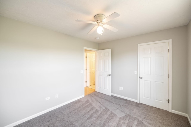 103 Alice Smith Dr, Portland, TN 37148 - unfurnished bedroom featuring carpet, baseboards, and a ceiling fan