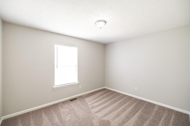 103 Alice Smith Dr, Portland, TN 37148 - carpeted spare room featuring baseboards and a textured ceiling