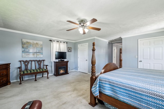 101 Townview Dr, Smyrna, TN 37167 - bedroom with light colored carpet, baseboards, a glass covered fireplace, a textured ceiling, and ceiling fan