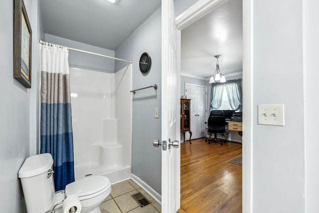 101 Townview Dr, Smyrna, TN 37167 - bathroom with toilet, a shower with shower curtain, crown molding, baseboards, and tile patterned flooring
