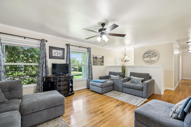 101 Townview Dr, Smyrna, TN 37167 - living room with crown molding, wood finished floors, a ceiling fan, and baseboards