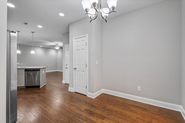 369 Carriage House Ln Unit L509, Hendersonville, TN 37075 - unfurnished dining area featuring baseboards, recessed lighting, dark wood-style floors, a ceiling fan, and a chandelier